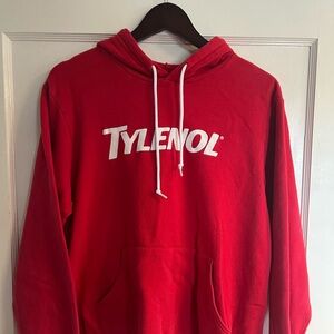 Red Hoodie with Tylenol Logo.